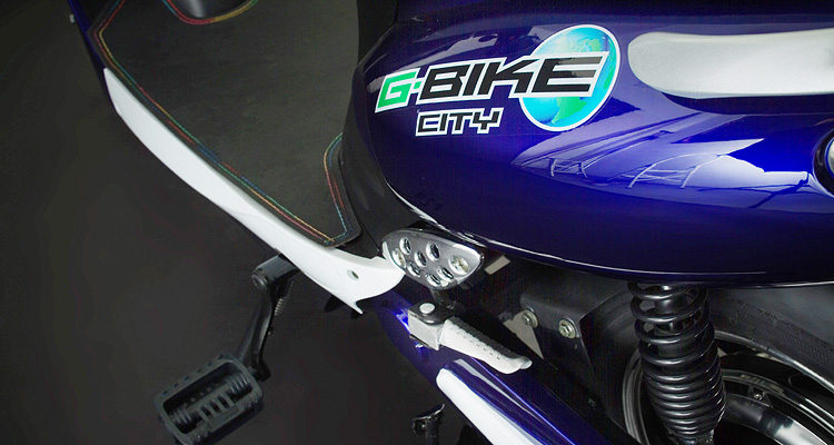 Detailed seat shot of blue electric bike