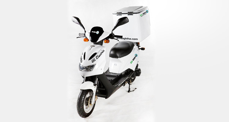 Angle shot of white commercial delivery scooter