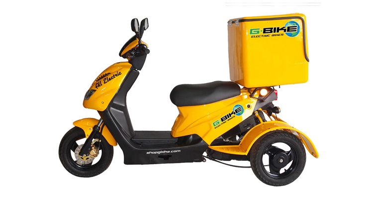 Side shot of yellow commercial delivery trike